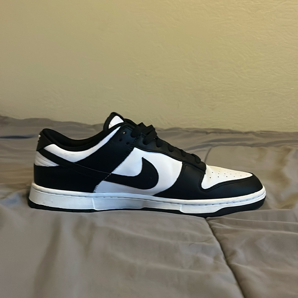 Nike low retro black and white panda dunks. StockX Verified. US MEN Size 12
